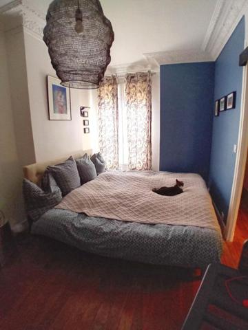 Appartement Haussmannien 75 m² traversant,  Balcons, ascenseur, chambre de service au 8 étage
