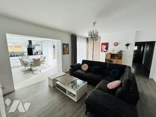 Rez de terrasse dans maison de 5 logements