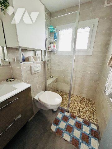 Rez de terrasse dans maison de 5 logements