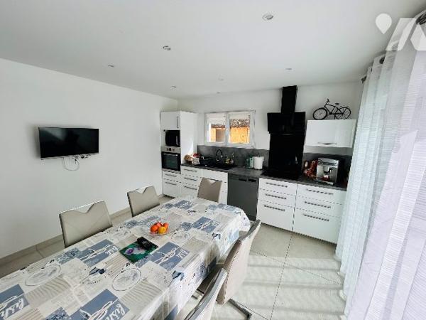 Rez de terrasse dans maison de 5 logements