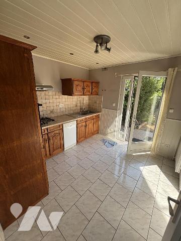 Maison jumelée avec garage