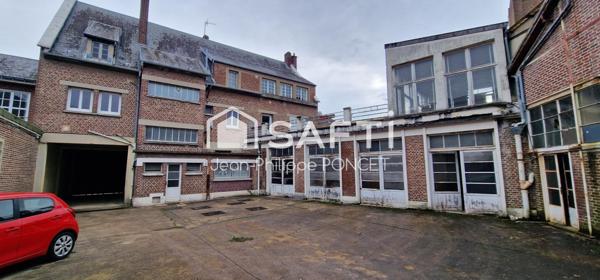 Immeuble de logements avec garages, terrasse et cour idéal investisseurs