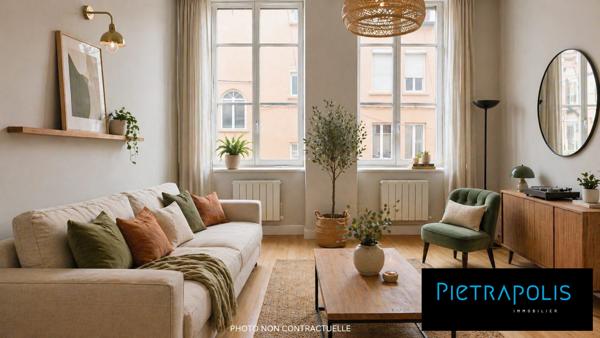 Appartement T3 de  56m2 (66m2 au sol) a deux pas de la Croix Rousse