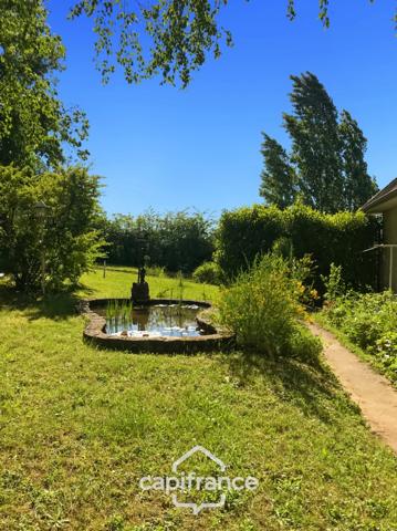 Maison à vendre 9 pièces MONTLUCON (03) sur terrain de 3600 m2 avec piscine et puits .
