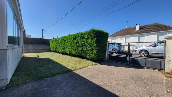 Maison de plain-pied avec jardin proche collège