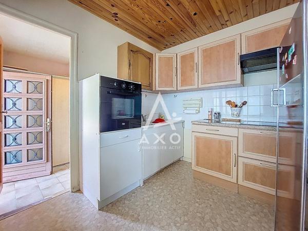 Maison de plain-pied avec jardin proche collège