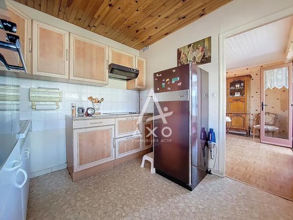 Maison de plain-pied avec jardin proche collège