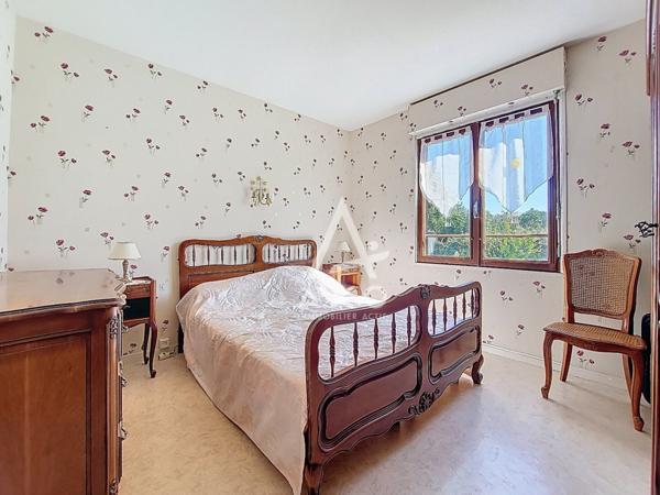 Maison de plain-pied avec jardin proche collège