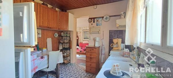 Maison  de plain-pied de 85 m2 avec deux chambres garage et jardin