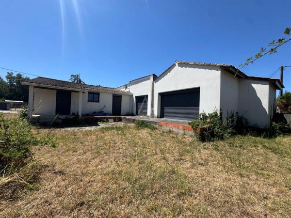Maison familiale plain-pied: 3 chambres, terrain de 1 300 m², centre de Saint-Yzan-de-Soudiac