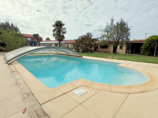 Maison traditionnelle + appartement de plain pied T3 - 9 pièce(s) 295 m²