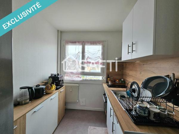 Appartement type F3 avec balcon et place de parking