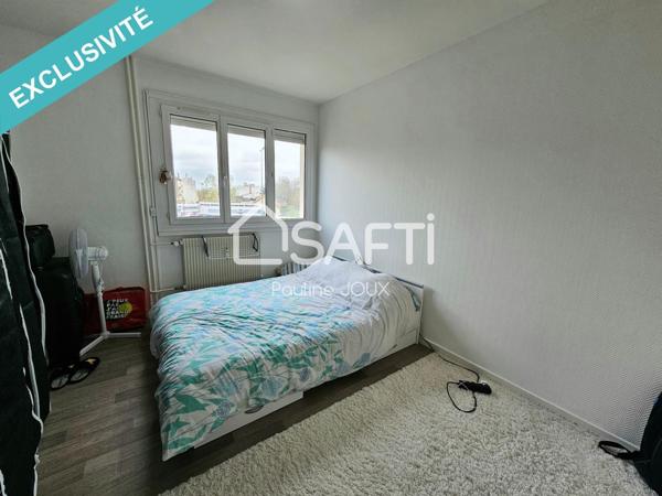 Appartement type F3 avec balcon et place de parking