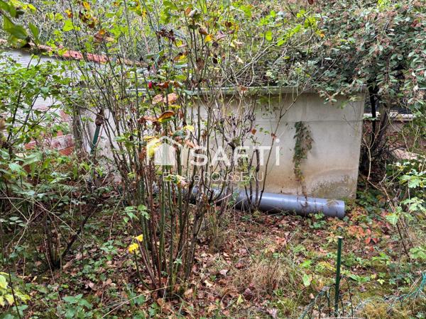 Terrain 125 m² non constructible avec garage 19m²