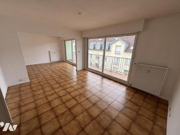 Appartement T3 (68 m² habitables) avec garage et cave situé en plein centre-ville