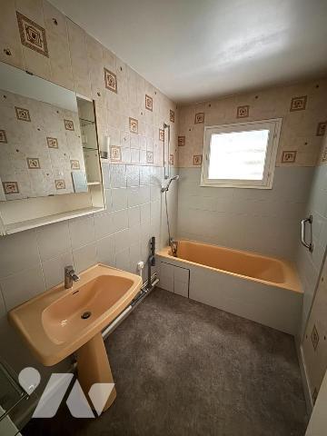 Appartement T3 (68 m² habitables) avec garage et cave situé en plein centre-ville