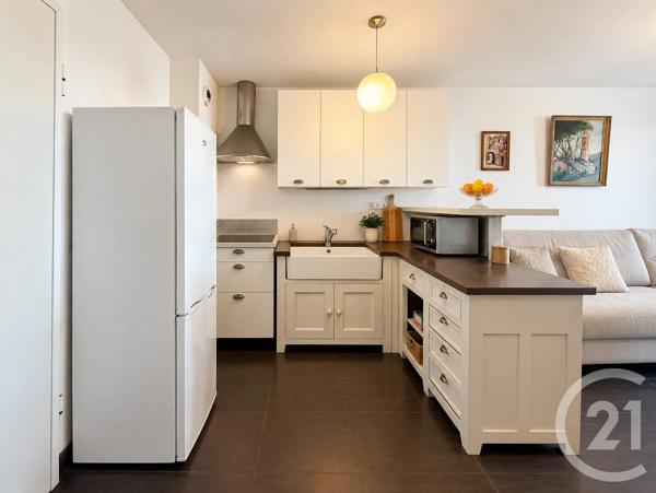 Appartement T2 à vendre  2 pièces - 36,36 m 2   L ILE ROUSSE  - 202