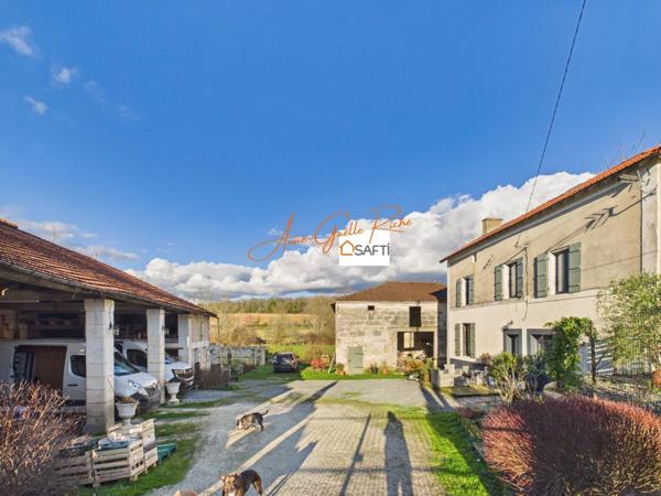 Corps de ferme avec dépendances et plus de 2 hectares de terrain