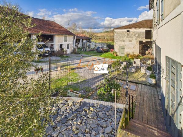 Corps de ferme avec dépendances et plus de 2 hectares de terrain