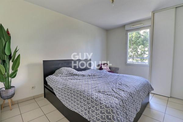 T3 vendu loué avec balcon et place de parking - Proximité Grand Parilly