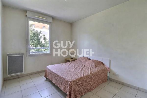 T3 vendu loué avec balcon et place de parking - Proximité Grand Parilly