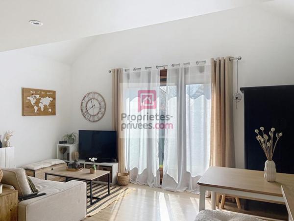 Appartement en duplex avec jardinet