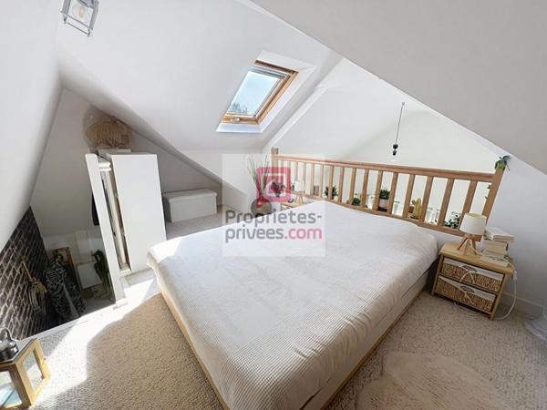 Appartement en duplex avec jardinet