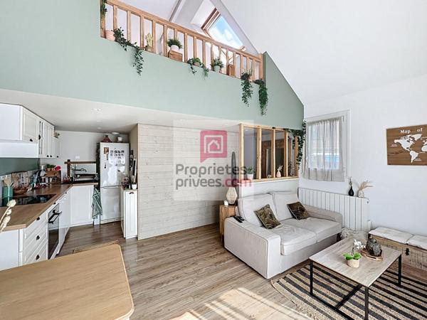 Appartement en duplex avec jardinet