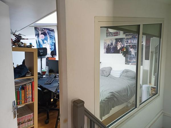 Maison de ville avec jardin, garage et potentiel d'évolution