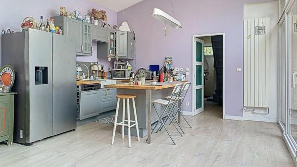 Maison de ville avec jardin, garage et potentiel d'évolution