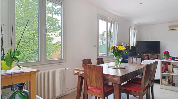 Maison de ville avec jardin, garage et potentiel d'évolution