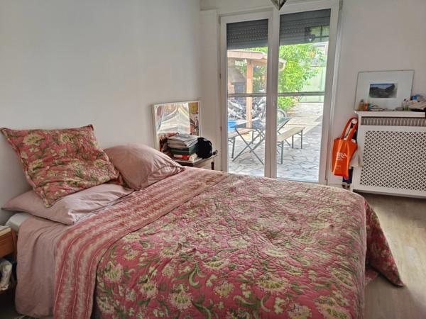 Maison de ville avec jardin, garage et potentiel d'évolution