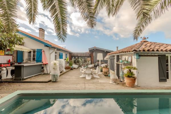 BIEN MIXTE AVEC LOCAL COMMERCIAL ET HABITATION À ANGRESSE