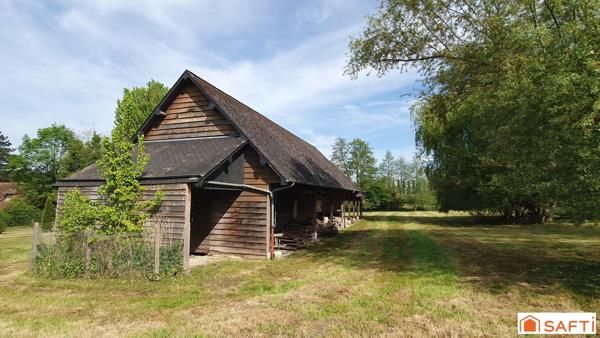 Très beau terrain arboré - Grand bâtiment