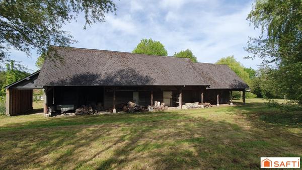 Très beau terrain arboré - Grand bâtiment