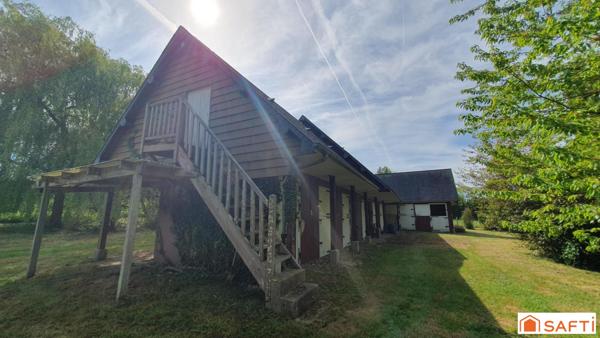 Très beau terrain arboré - Grand bâtiment