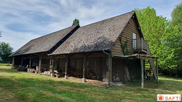 Très beau terrain arboré - Grand bâtiment