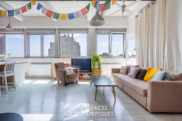 Dernier étage avec rooftop et vue époustouflante