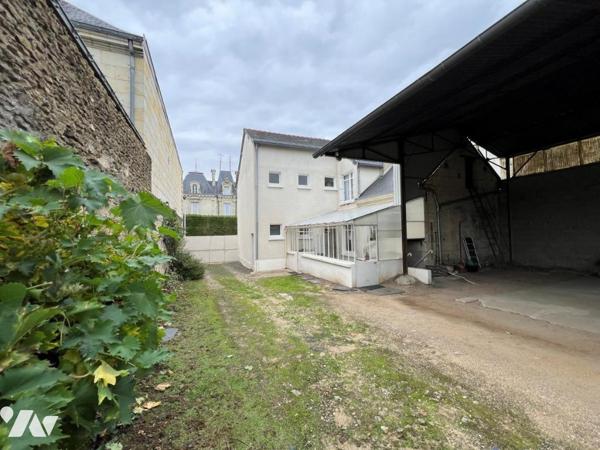 Centre ville de LONGUE maison terrain et hangar