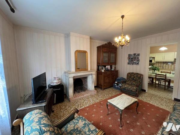 Centre ville de LONGUE maison terrain et hangar