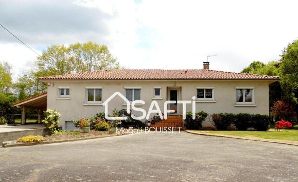 Maison de plain-pied T6 de 168m2, 3 chambres, grande terrasse, sous sol, garage, carport et son parc plat, arboré de 1929m2.
