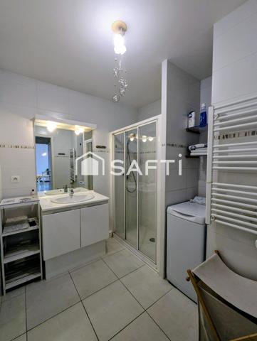 Appartement "le tout à pied" proche des commodités, de la gare, à 100 m du bord de mer, terrasse et garage