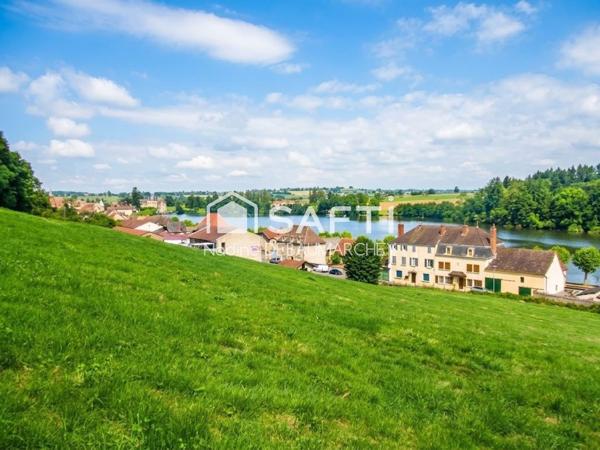 Terrain à bâtir de 6526 m² à La Clayette avec vue lac et château