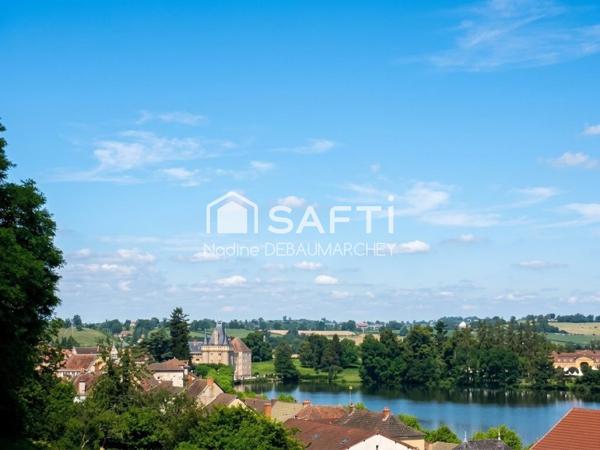 Terrain à bâtir de 6526 m² à La Clayette avec vue lac et château
