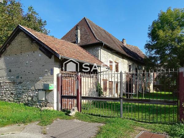 Opportunité Unique à Morestel : Ensemble Immobilier avec Potentiel !