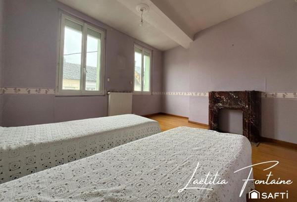 Maison à rénover avec cour et dépendance