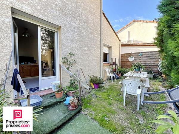 Centre ville  - Appartement  RDC 65 m2 avec JARDIN et PARKING PRIVÉ