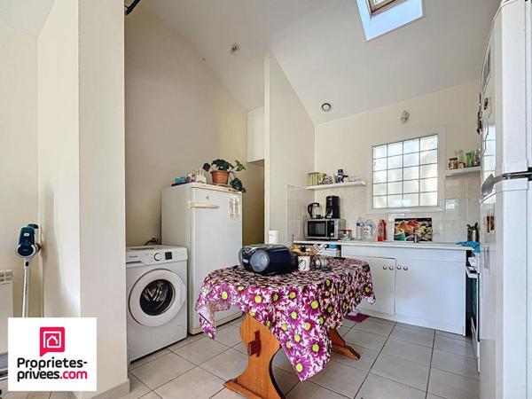 Centre ville  - Appartement  RDC 65 m2 avec JARDIN et PARKING PRIVÉ