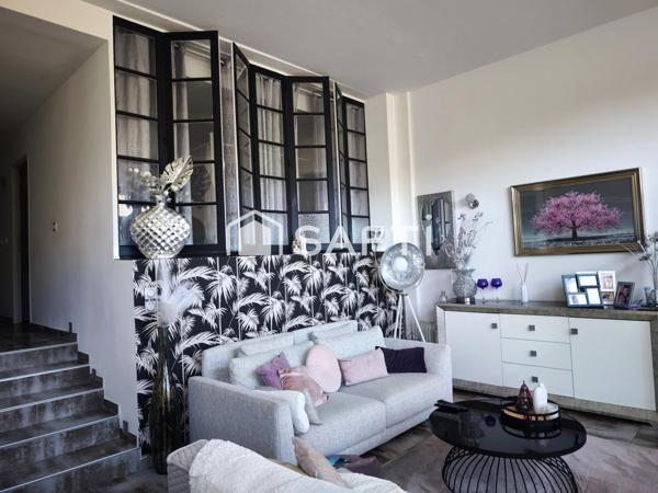 Appartement T3 atypique avec jardin, terrasse et garage – Coup de cœur assuré
