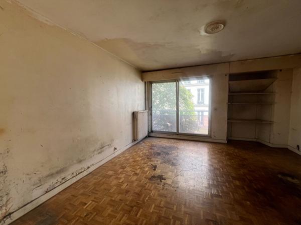 Exclusivite - A vendre : Appartement moderne de 28,03 m2 a Paris - Ideal investisseur - A renover - Balcon